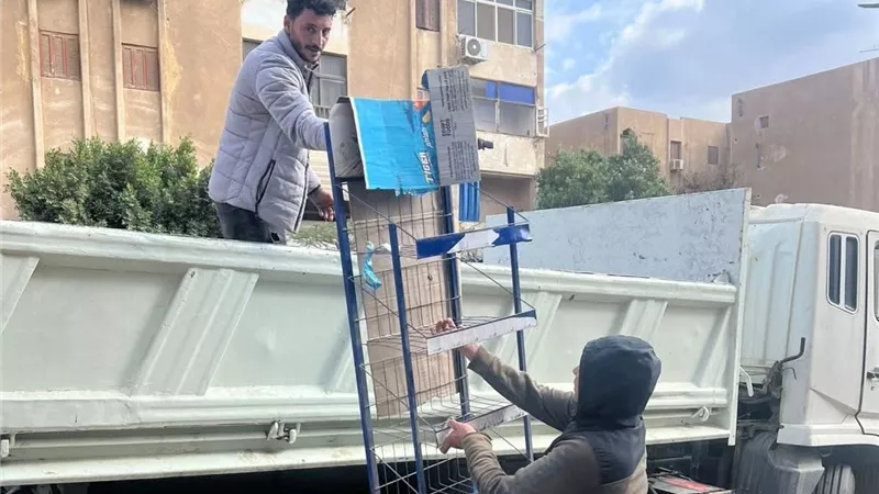 حملات لرفع الإشغالات ومتابعة رخص التشغيل للمحلات بالشيخ زايد 